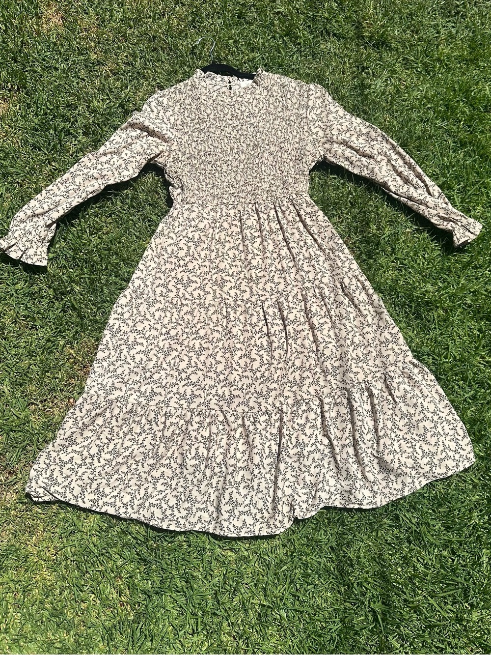 High-neck Cream Floral Midi Dress with smocked bodice and long sleeves